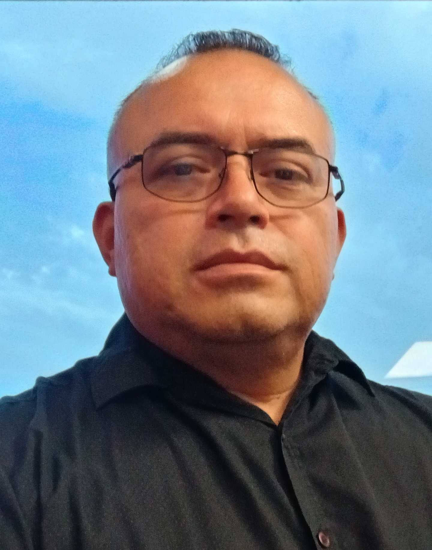 Americo Rojas' headshot